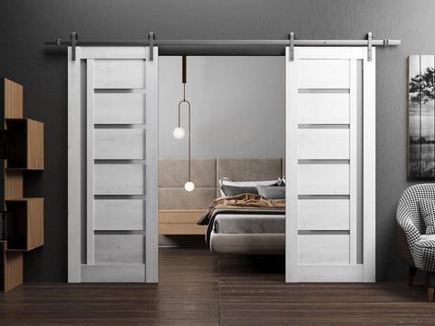 Nordic white Quadro 4088 Barn Door Set with frosted glass, 84x96 inch dual sliding doors, solid MDF core, installed in a bedroom.