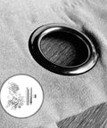 Close-up of 10mm Steel Eyelet Punch Tool And Base Kit With 100 Silver Eyelets installed on fabric