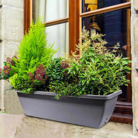 Six Pack 24 Inch Window Box Planters With Shelf Insert Large Rectangular Plastic Flower Boxes mounted on a windowsill with greenery