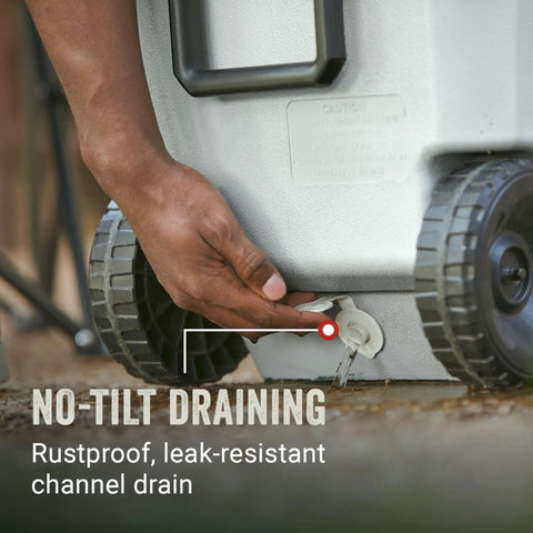 100 Qt Wheeled Marine Cooler With Fully Insulated Lid And Body Keeps Ice Up To Five Days In 90 Degree Heat Holds 160 Cans UV Coated Exterior And Rust Resistant Stainless Hardware Built Tough For Weekend Adventures, shown draining via channel.