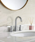 Two Handle Widespread Bathroom Faucet With Pop Up Drain No Fuss High Arc 8 Inch Vanity Lavatory Brass Spout 360 Degree Swivel Drip Free Ceramic Cartridge Lead Free CUPC NSF61 CEC Certified installed on white marble vanity.