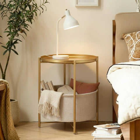 Round End Table With Removable Fabric Storage Basket And Tray Top, Gold Metal Nightstand beside bed with books and lamp