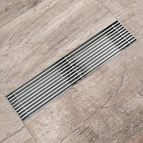 Badass Linear Shower Drain With Airtight Deodorizer Gasket And Slick Chrome Face For Bathrooms Garages And Basements on tiled floor.