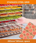 Commercial Electric Food Dehydrator Stainless Steel Jerky Maker With Reliable Touch Controls For No Hassle Drying Of Fruits Meats Vegetables Herbs And Snack Game Changers, showing stainless steel grid with various dehydrated fruits and vegetables.