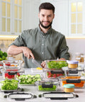 Man prepping vegetables with 40 Piece Borosilicate Glass Food Storage Set With Lids, Leak Proof And BPA Free, Reusable Containers
