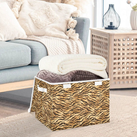 Collapsible Storage Bin With Flip Top Lid And Carry Handles For Bedroom Organization Straight Up Solid 300D Oxford Fabric Crate Folds Flat with blankets inside.