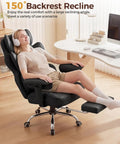 Person reclining in big and tall office chair for heavy duty comfort with deluxe embossed leather, foot rest extended.