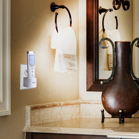 Go-To Motion Sensor LED Flashlight Night Light plugged in bathroom, illuminating the countertop with ambient light.
