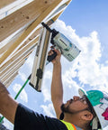 Construction worker using Framing Nailer For Pro Builders, Lightweight Pneumatic Power Tool Built For Floor Wall And Roof Decking