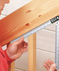 Heavy Duty Stainless Steel Digital Angle Finder And Precision Protractor Ruler measuring a 45-degree angle on wooden beams.