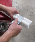Hands using Value Duct Tape 1900 Single Roll, Silver Thin Cloth-Backed Film with High-Tack Synthetic Rubber Adhesive on tubes