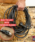 Hand holding Heavy Duty 100 Ft Indoor Outdoor Extension Cord 16 AWG 3 Prong SJTW Weatherproof Cable on hay bale