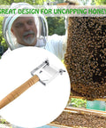 Beekeeper using Adjustable Honey Uncapping Fork with Stainless Steel Blade and Wooden Handle for efficient comb scraping