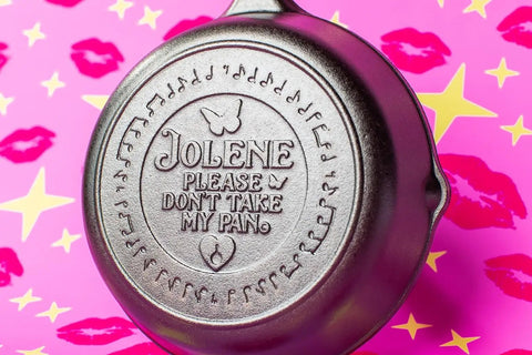 Jolene Inspired Dolly Parton Cast Iron Skillet Collectible Frying Pan With Signature Design displayed on a pink background