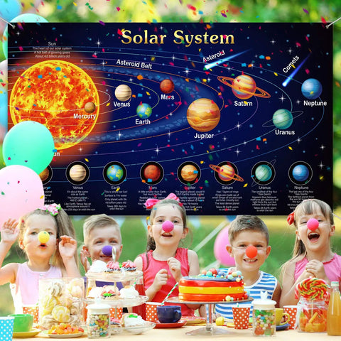 Giant Solar System Poster Banner For Space Themed Parties And Classroom Decor with happy children celebrating underneath.