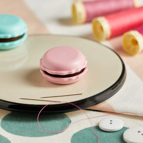 Sweet N Sharp Macaron Sharpener And Needle Minder Raspberry For Precise Sewing, Easy Needle Care, Quick Fixes On The Fly, Compact Crafting Tool For Quilters And Stitchers, Keeps Points Sharp And Shafts Smooth, pink macaron needle minder on sewing tray