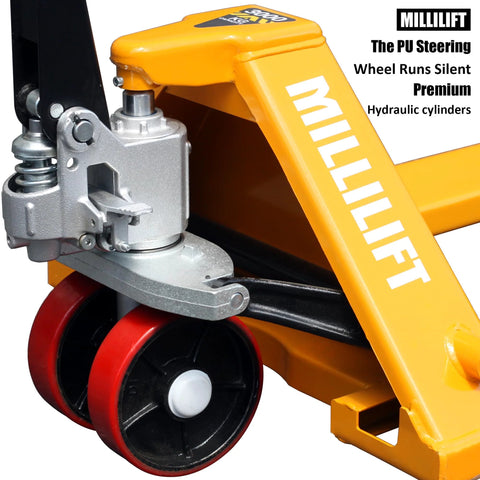 Close-up of yellow Workhorse Manual Pallet Jack with 6600 lb capacity showing PU steering wheel and hydraulic cylinder.