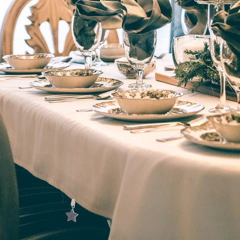 Elegant dining setup with Eight Ounce Tablecloth Weights With Stainless Steel Clips For Outdoor Tables Stay Put Windproof