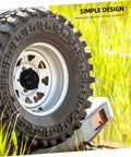Spare Tire Bolt Retainer Clamp For CRV 74652 003 Heavy Duty Steel attached to a spare tire on grassy field