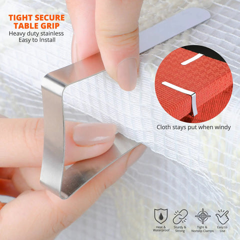 Hand securing stainless steel tablecloth clip with rock solid grip on table, showing tight grip and sturdy material.