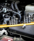 Must-Have 10mm Socket Set For 1/4 And 3/8 Inch Drives displayed on a car engine, chrome finish resists corrosion