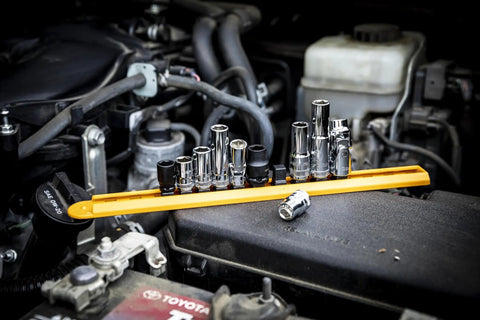Must-Have 10mm Socket Set For 1/4 And 3/8 Inch Drives displayed on a car engine, chrome finish resists corrosion