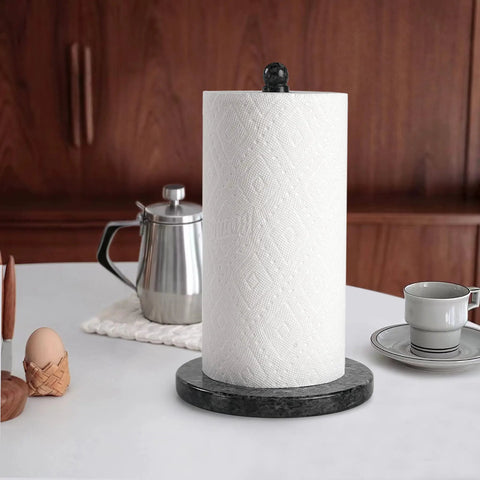 Blue Pearl Granite Paper Towel Holder for Kitchen Countertop with a roll of paper towels on granite base near coffee setup.