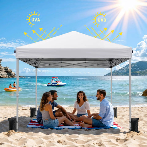 One Button Quick Setup 10x10 Pop Up Canopy With Carry Bag Portable Instant Shade Tent For Outdoor Events Parties Camping Includes 4 Sandbags And 8 Stakes White on beach with group of people under shade