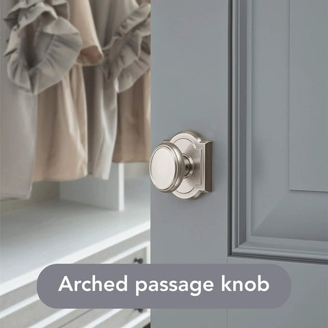 Interior Passage Door Knob In Satin Nickel With Microban Protection on a closet door, showcasing non-locking handle design