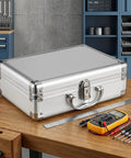 Tough As Nails Lockable Aluminum Alloy Toolbox With Shock Absorbing Foam Insert Portable hard storage case on a workbench.