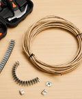 Heavy Duty Upholstery Stay Wire And Spring Repair Kit With 60 Feet Paper Wrapped Cord Plus 120 Solid Clips To Quick Fix Sagging Couches No Sweat, featuring wrapped cord and metal clips.