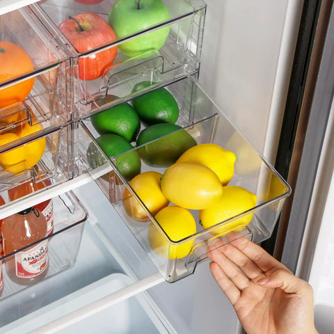 Solid 4 Pack Stackable Clear Storage Drawers With Removable Dividers To Crush Household Clutter Right Now holding lemons in a fridge.