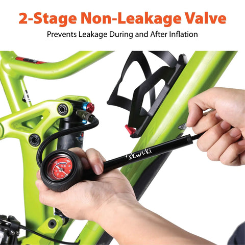 Person using High Pressure Shock Pump With Gauge For Mountain Bikes 400 PSI Front Fork And Rear Shock Inflator on a bike