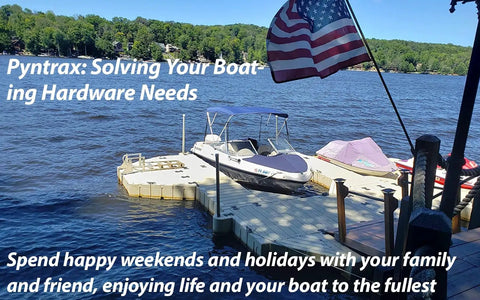 Boats on a dock with American flag by a lake, highlighting marine lifestyle and relaxation.