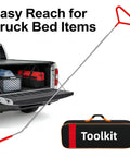 Pickup truck with tailgate down showing storage bag and reaching tool in use for easy access to items in truck bed