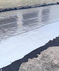 Hella Tough Asphalt Roof Shingle Repair Tape With Reflective Aluminum Foil Backing used on flat roof surface for waterproof sealing.