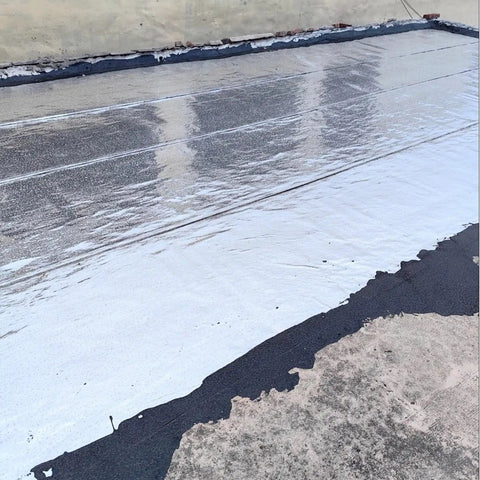 Hella Tough Asphalt Roof Shingle Repair Tape With Reflective Aluminum Foil Backing used on flat roof surface for waterproof sealing.