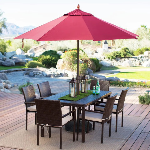 Beefy 52 Pound Heavy Duty Umbrella Base With Brakeable Wheels For Outdoor Use under red market umbrella on patio set