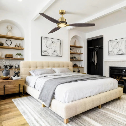 56" Soft Brass Chandelier Ceiling Fan,2 Downrods Fandelier with Remote above a stylish bedroom with solid wood blades.