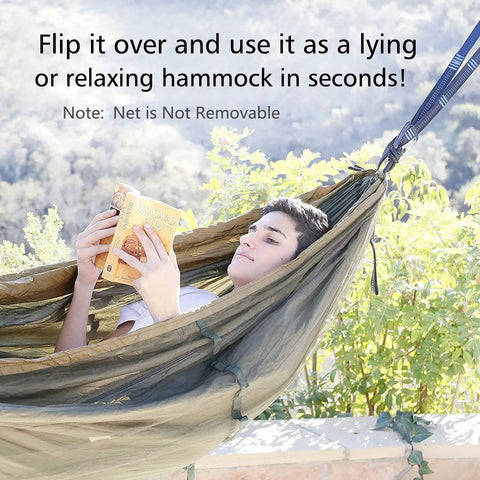 Person reading in Portable Camping Hammock With Net For Single Or Double Use at outdoor setting.