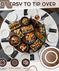 Solid Piece 20 Inch Black Walnut Lazy Susan Serving Tray Featuring A Smooth Operator Rotating Turntable Platform With Heaps Of Space For Condiments And Dinner Parties, beautifully set with food on a round table.