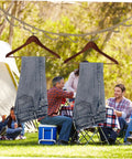 Outdoor Clothesline Rope Kit For Camping And Travel Non Slip Quick Fastening Drying Line with jeans hanging in forest camp