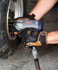 Using Half Inch Pneumatic Impact Wrench With 750 Ft Lbs Torque Three Speed Regulator For Easy Lug Nut Removal On Lawn Equipment