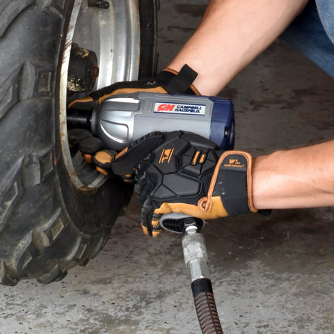 Using Half Inch Pneumatic Impact Wrench With 750 Ft Lbs Torque Three Speed Regulator For Easy Lug Nut Removal On Lawn Equipment