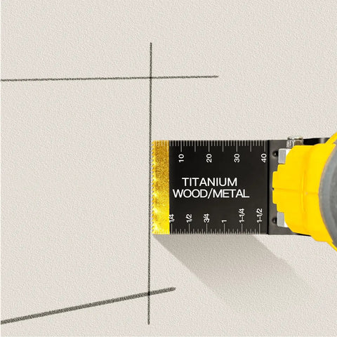 Close-up of Titanium Coated 31 Piece Oscillating Tool Blades Set cutting drywall, showing blade marks.