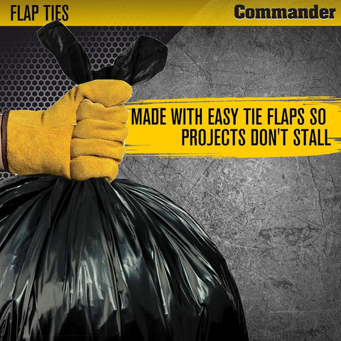 Gloved hand holding 55 Gallon 3 Mil Heavy Duty Contractor Trash Bags with flap ties, ideal for construction sites and outdoor projects.