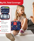 Mom using Kids First Aid Kit 246-Piece Bundle For Travel, Home, And Car Emergency Needs on child; portable mini bag visible