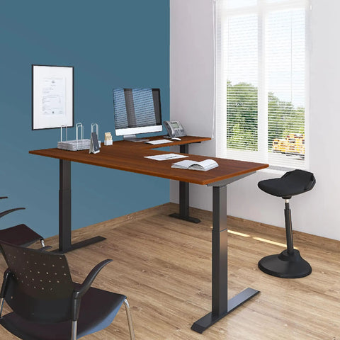 Level Up Your Remote Setup With This Hella Reliable Triple Motor Electric L Shaped Corner Standing Desk Featuring Smooth Programmable Height Presets Snap Together Black Steel Frame And Solid Teak Desktop For Non Stop Productivity, angled view in home office.