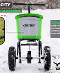 Beast 50 Lb Walk Behind Spreader For Lawn Care, 10 To 12 Foot Coverage, showing composite hopper and clog-free grate