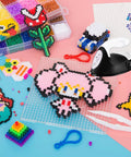 Ultra Compact Mini Heat Press Machine Portable Steam Iron With Charging Base For Diy T Shirts Shoes Bags And Hats on crafting table with beads.